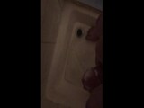 Stocky guy jerking off his soapy cock in the shower with cumshot