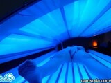 teen latina gets caught rubbing her clit while using a tanning bed