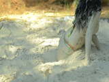 Bikini girl in the mud