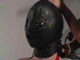 slave in latex introduced to breath play