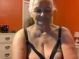 Grandma 68 years shows big tits and pussy